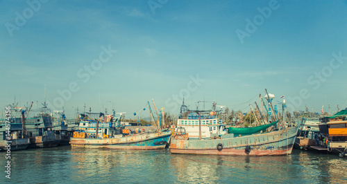 Old wreck Ship Harbor fishing and travel boat stranded. Thailand.