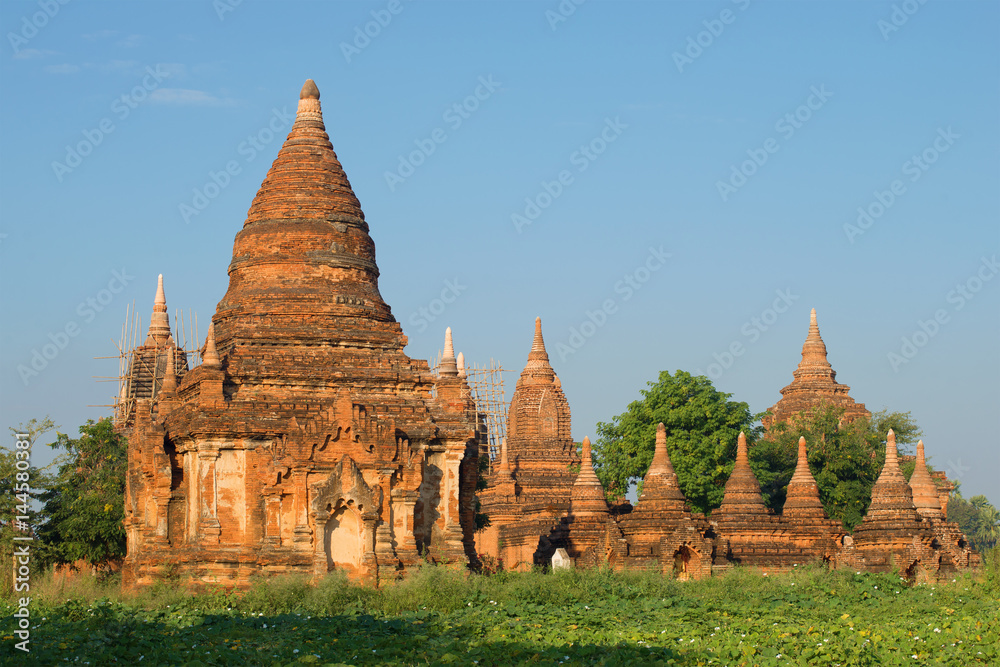 Ancient Buddhist temple complex on a sunny morning. Bagan, Burma
