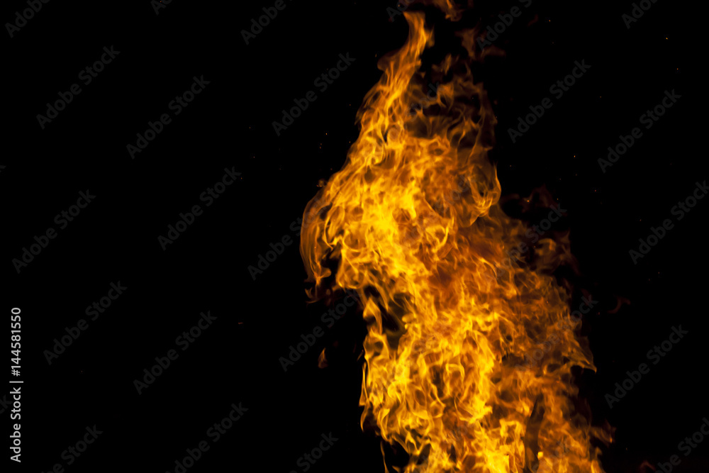 Obraz premium Yellow and orange fire frames isolated on a black background