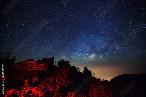 Doi Luang Chiang Dao, Chiang Mai - Febuary 13, 2016 : Milky Way Galaxy at Doi Luang Chiang Dao with Thai Language top point signs.