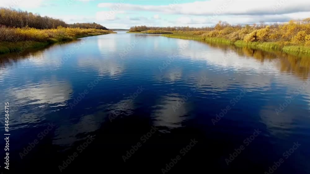 A river flows in this beautiful scene. Scandinavia in autumn. 4k resolution A river flows in this beautiful scene. Scandinavia in autumn. 4k resolution