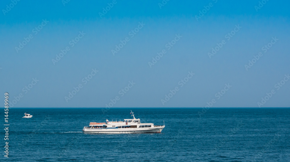 ship and boat in blue sea