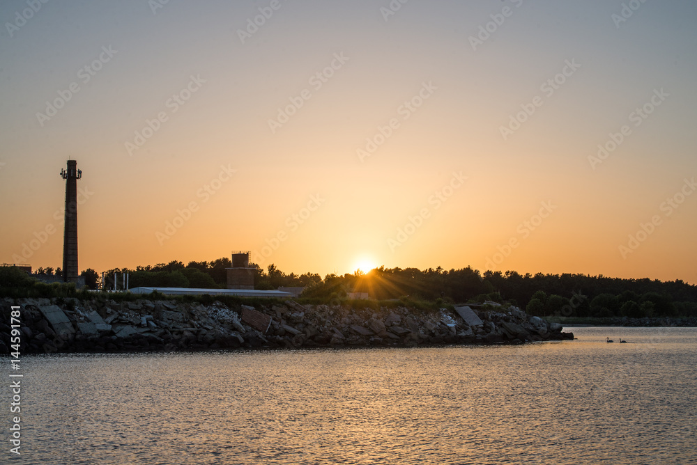 Lighthouse on sunset, Baltic Sea