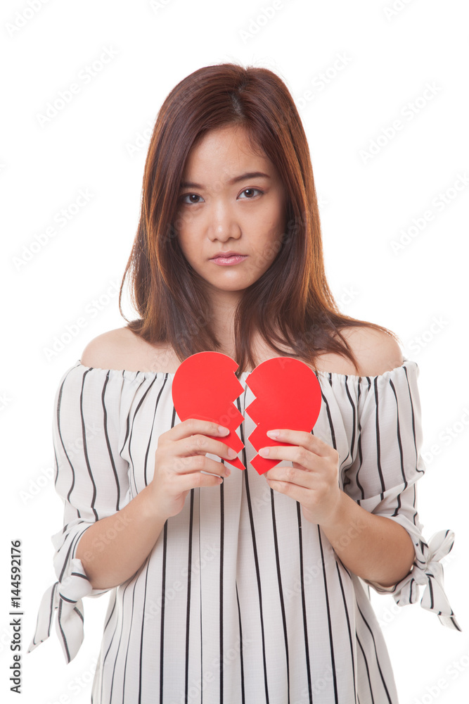 Beautiful young Asian woman with broken heart.