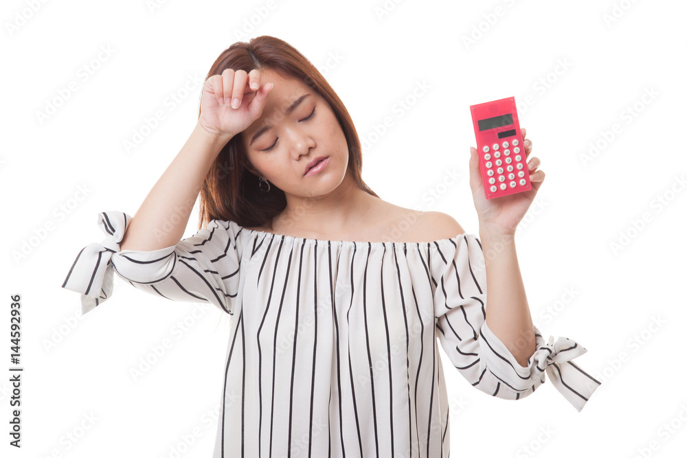 Asian woman got headache with calculator. Asian woman got headache with calculator.