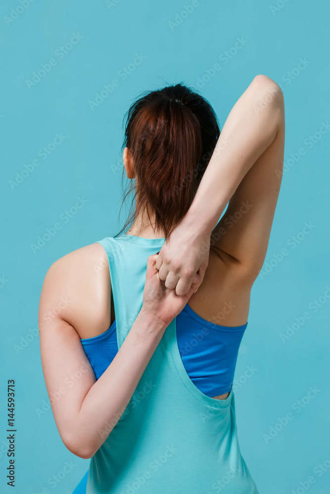 Photo of sportwoman sporting yoga