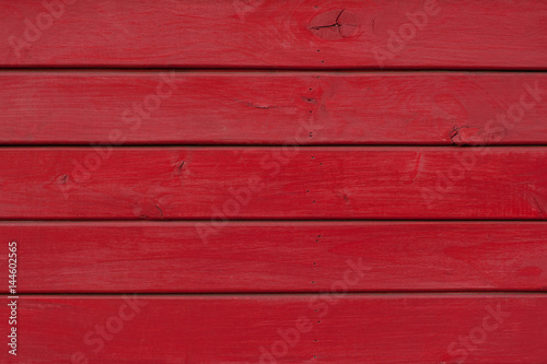 Red painted wooden planks texture for background