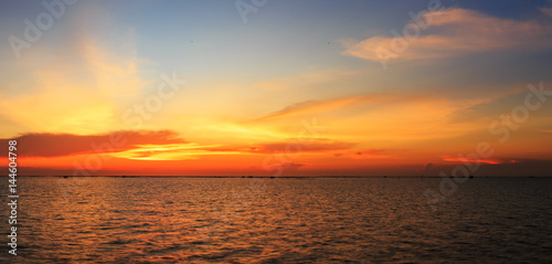Panorama view of sunset over shell farm