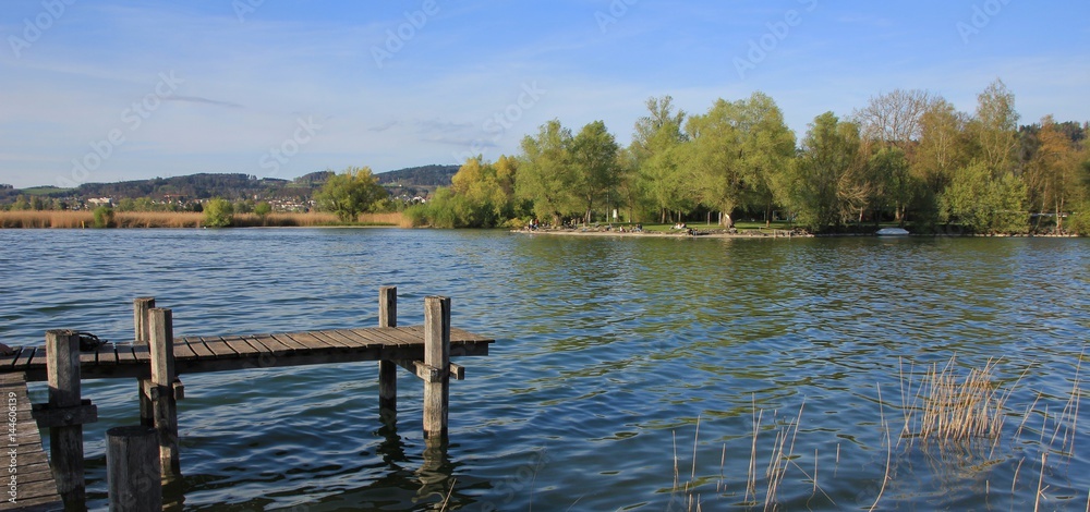 Gangplank at lake Pfaffikon. Auslikon, place popular for swimming and recreation.