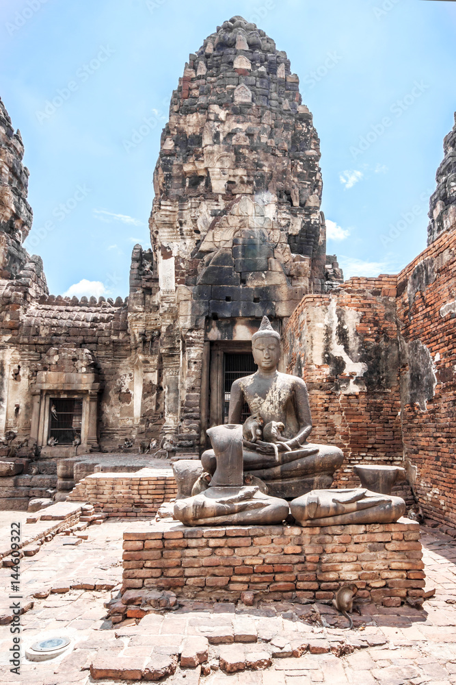 Archaeological site and Buddha statue. Travel Lopburi in Thailand.