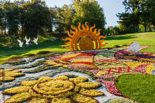Fototapeta Sculpture made from summer flowers
