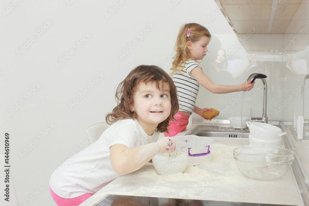 happy family funny kids are preparing the dough, bake cookies in the kitchen happy family funny kids are preparing the dough, bake cookies in the kitchen
