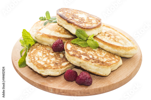 Fotomural Cheese pancakes on wooden board