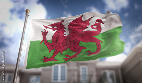 Fotografija Wales Flag 3D Rendering on Blue Sky Building Background