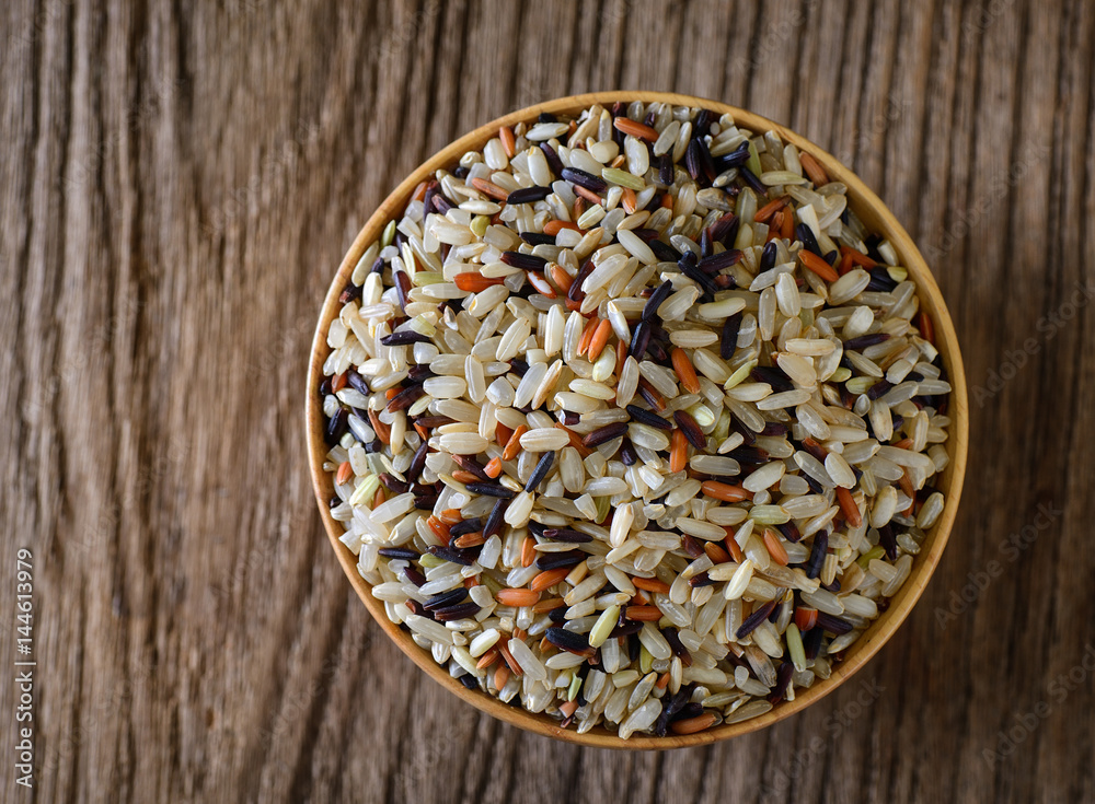 Brown rice seed in bowl. Top view. Brown rice seed in bowl. Top view.