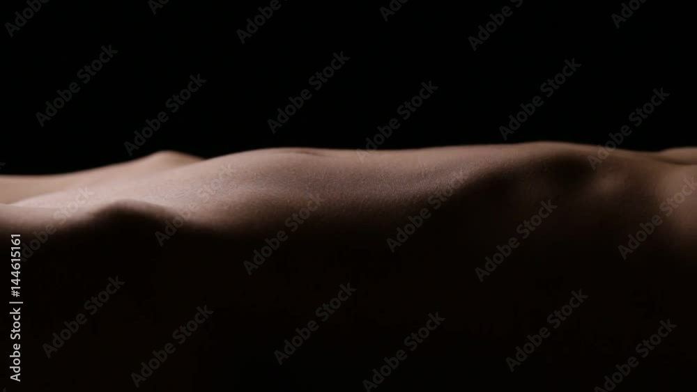 Slim beautiful body of unrecognizable female. Vertical panning. Seamless loop Slim beautiful body of unrecognizable female. Vertical panning. Seamless loop
