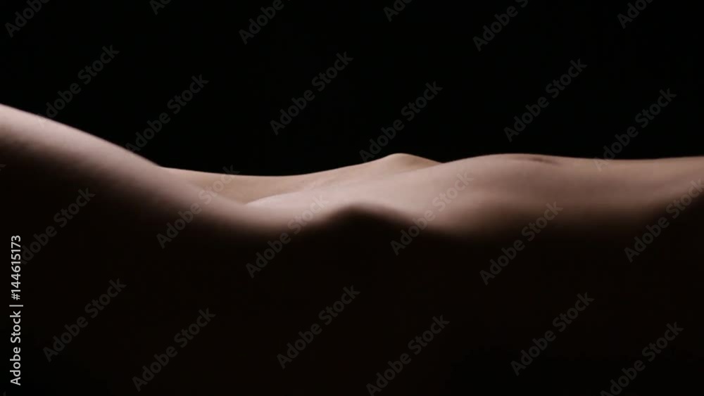 Slim beautiful body of unrecognizable female. Focus transition