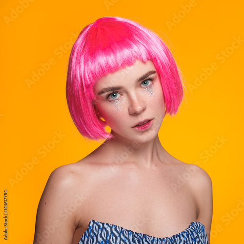 Pretty stylish girl with pink hair