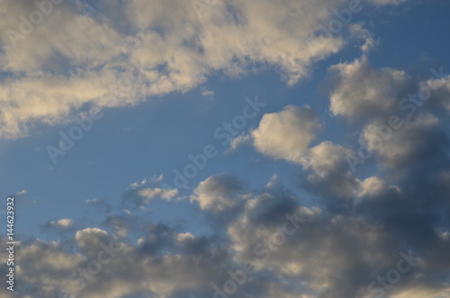 The spring sky. Fluffy clouds in the sky. Seamless sky texture
