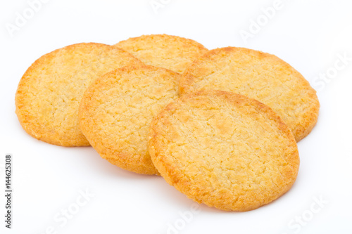 Stacked short pastry cookies isolated on white background.