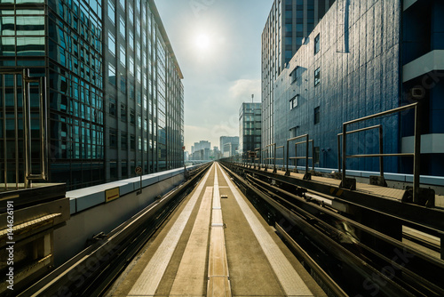 Photography Front view of train in modern city