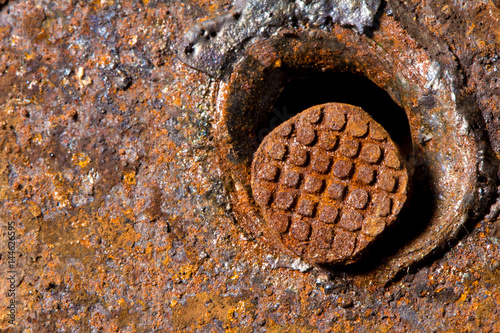 Забитый в железо гвоздь. Гвоздь, металл, сварка. The nail hammered into iron. Nail, metal, welding.