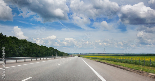 Landscape with countryside highway at summer in Russia.