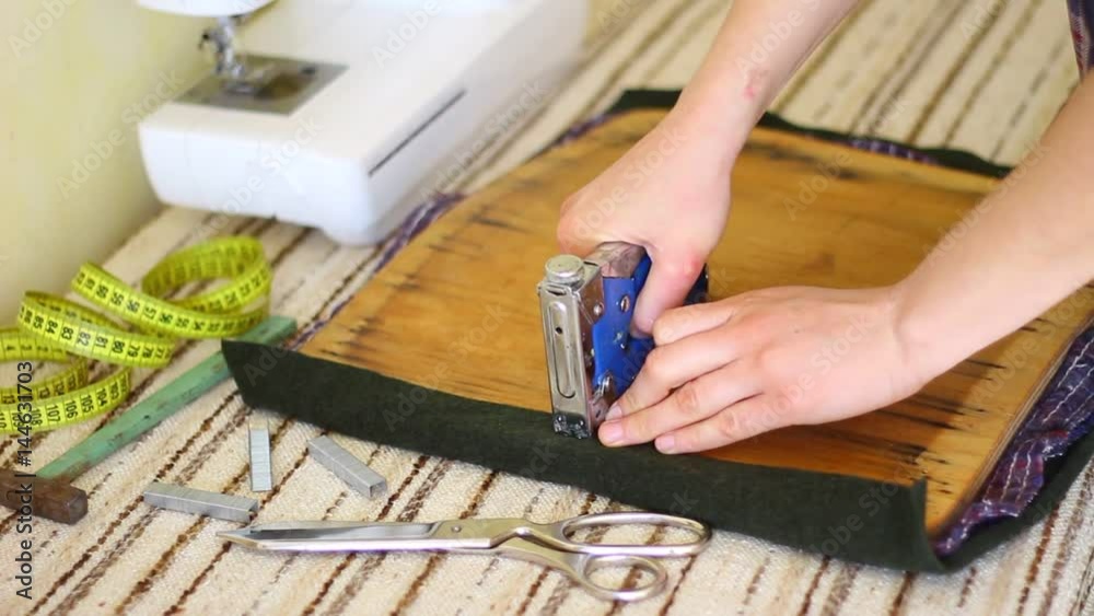 Upholstery A Chair By Using HeavyDuty Staple. Staple a fabric to the