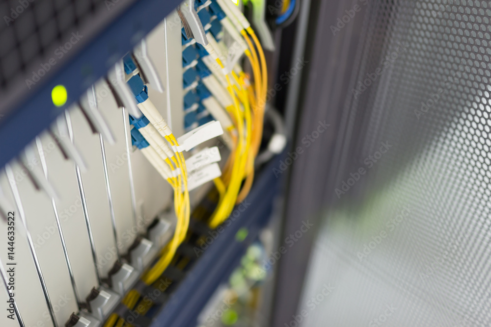fiber optic with servers in a technology data center fiber optic with servers in a technology data center