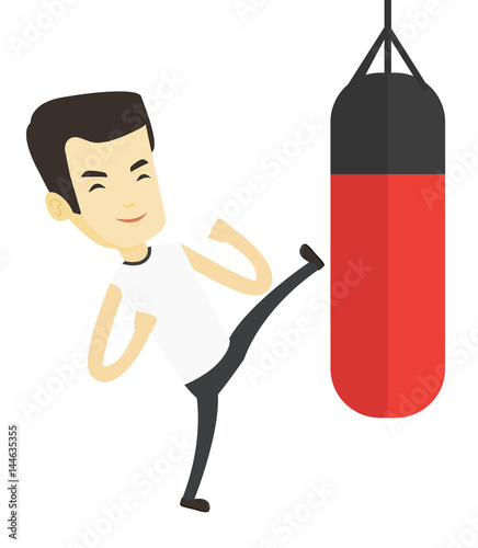 Man exercising with punching bag.