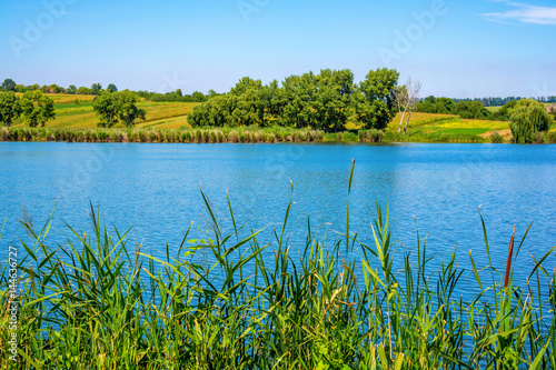 Photo of nature around beautiful blue lake