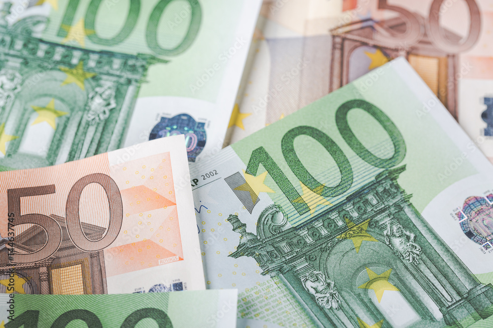 Detail of banknotes of the European Union as a background with selective focus Detail of banknotes of the European Union as a background with selective focus