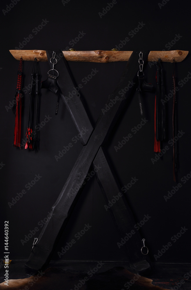 Naklejka premium Wooden sexual bondage cross