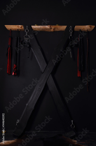 Wooden sexual bondage cross