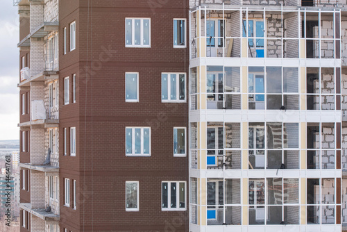 the construction of an apartment house (brick house)