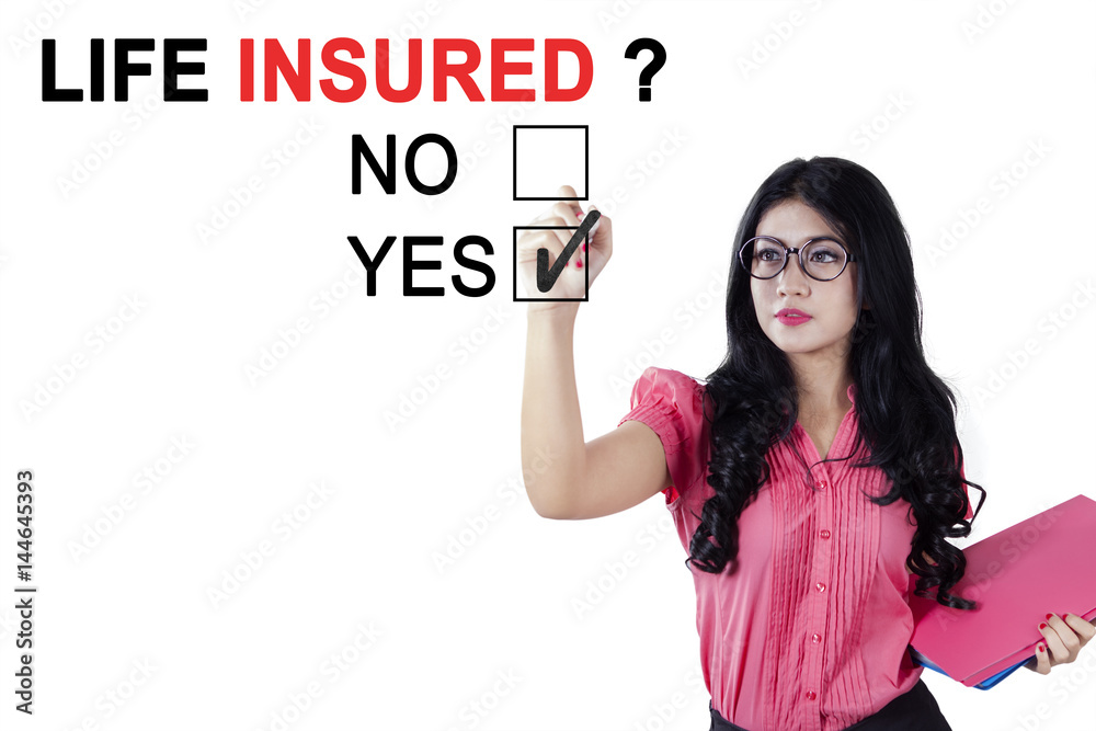 Businesswoman is approving life insured