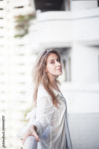 Sweet girl on the balcony 