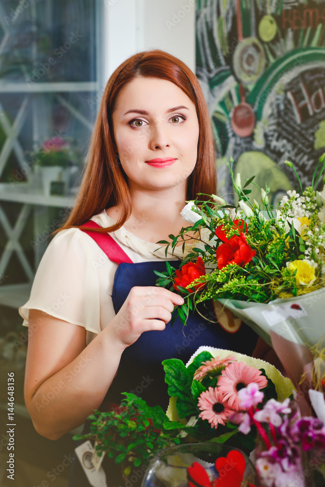young girl working in a flower shop