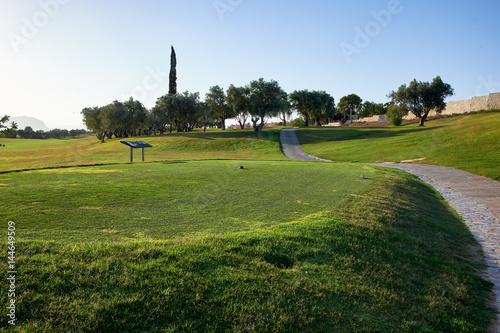 Golf course with gorgeous green and pond. Algorfa, Spain. photo