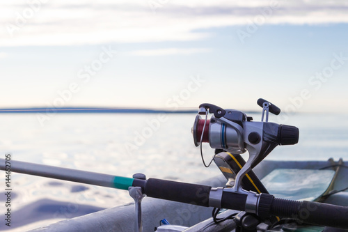 Spinning reel on a boat fishing