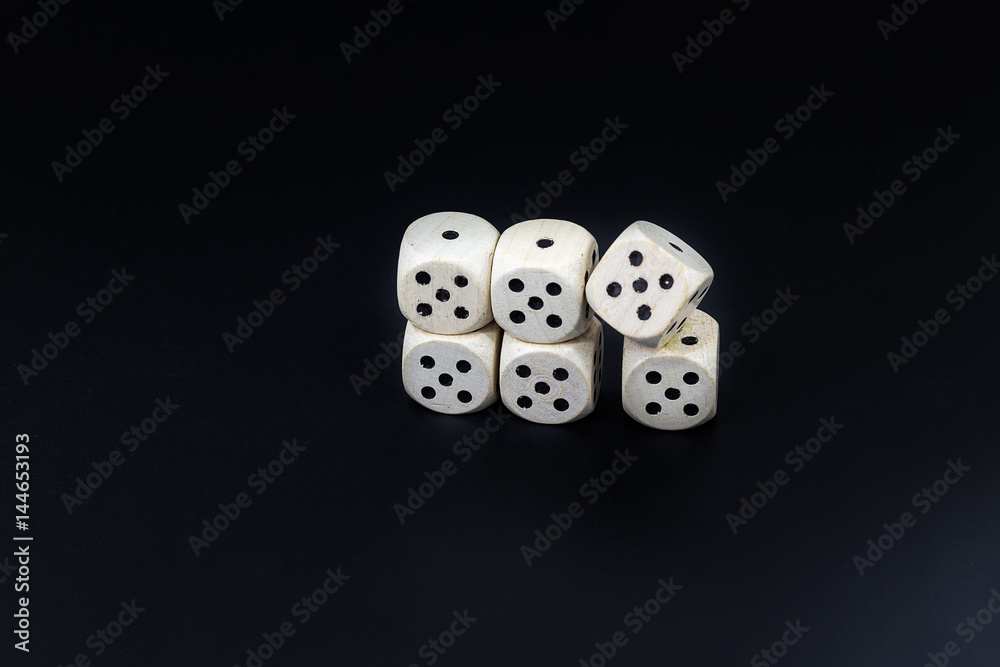 Dice six fives on a black matte background Dice six fives on a black matte background