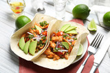 Delicious tacos with tequila lime chicken on plate