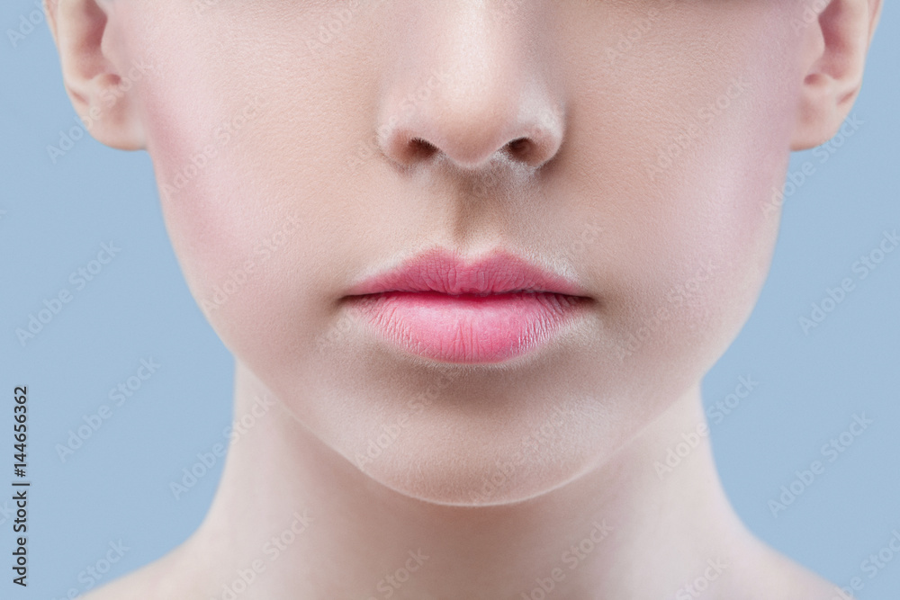 Beauty. Beautiful Woman Face With soft color Lipstick. Sexy Full Lips. Horizontal Portrait Of Female Model With art Makeup. Closeup Of girl Face With Soft Skin. Cosmetics and Skincare concept Beauty. Beautiful Woman Face With soft color Lipstick. Sexy Full Lips. Horizontal Portrait Of Female Model With art Makeup. Closeup Of girl Face With Soft Skin. Cosmetics and Skincare concept