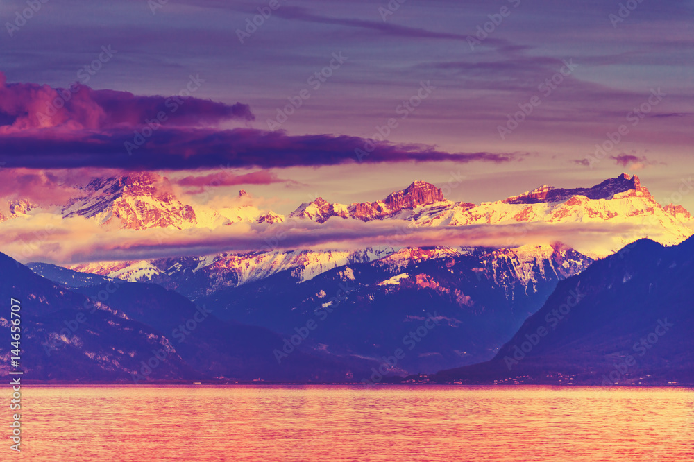 Pink sunset over Alps and Lake Geneva, Switzerland