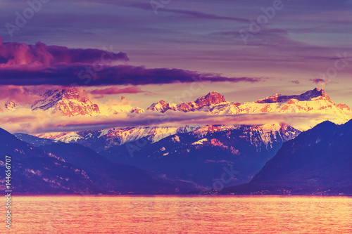 Pink sunset over Alps and Lake Geneva, Switzerland