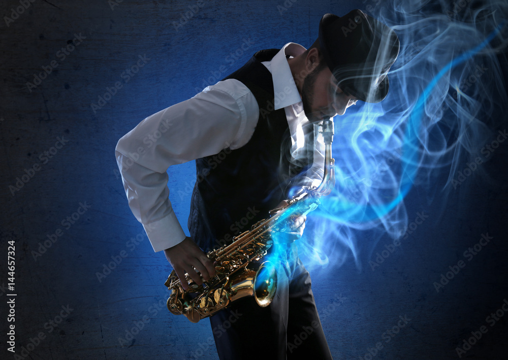 Naklejka premium Elegant saxophonist plays jazz on dark background