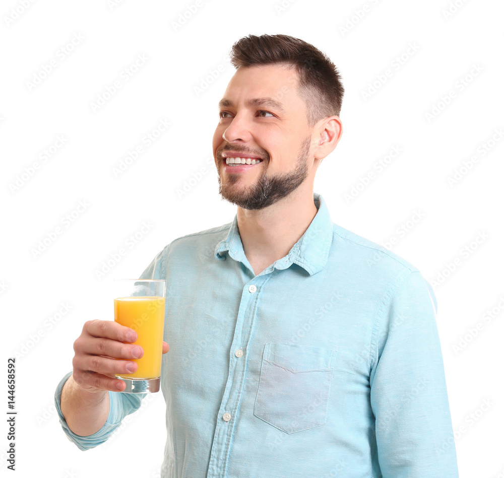 Handsome man posing with juice on white background Handsome man posing with juice on white background
