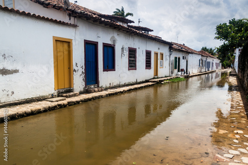 Flooded street in colonial town Paraty, Brazil © Matyas Rehak