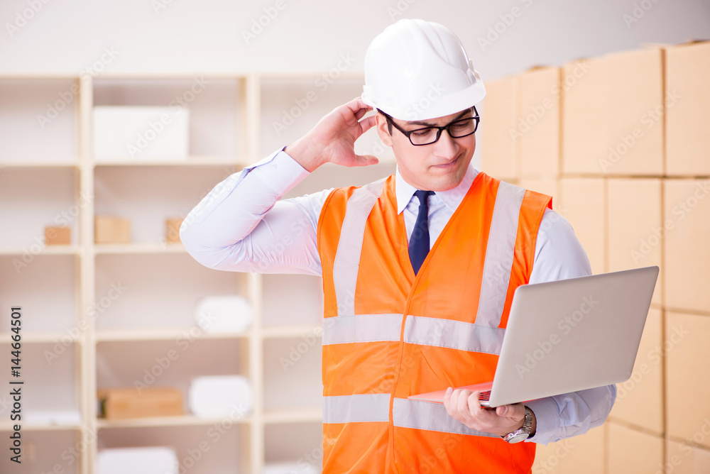 Man working in postal parcel delivery service office Man working in postal parcel delivery service office