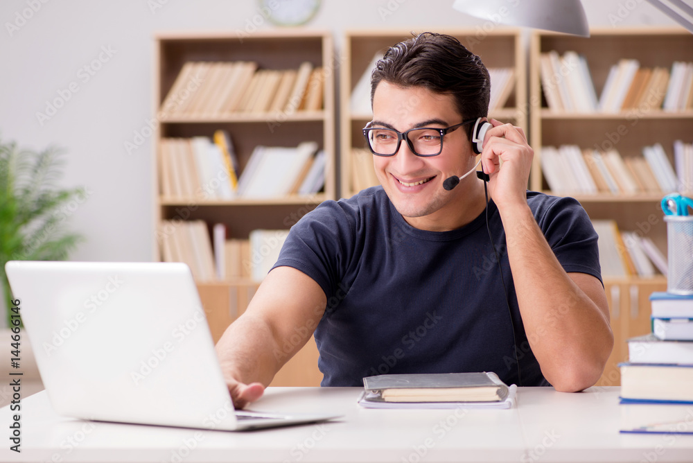 Young freelance worked working on computer Young freelance worked working on computer